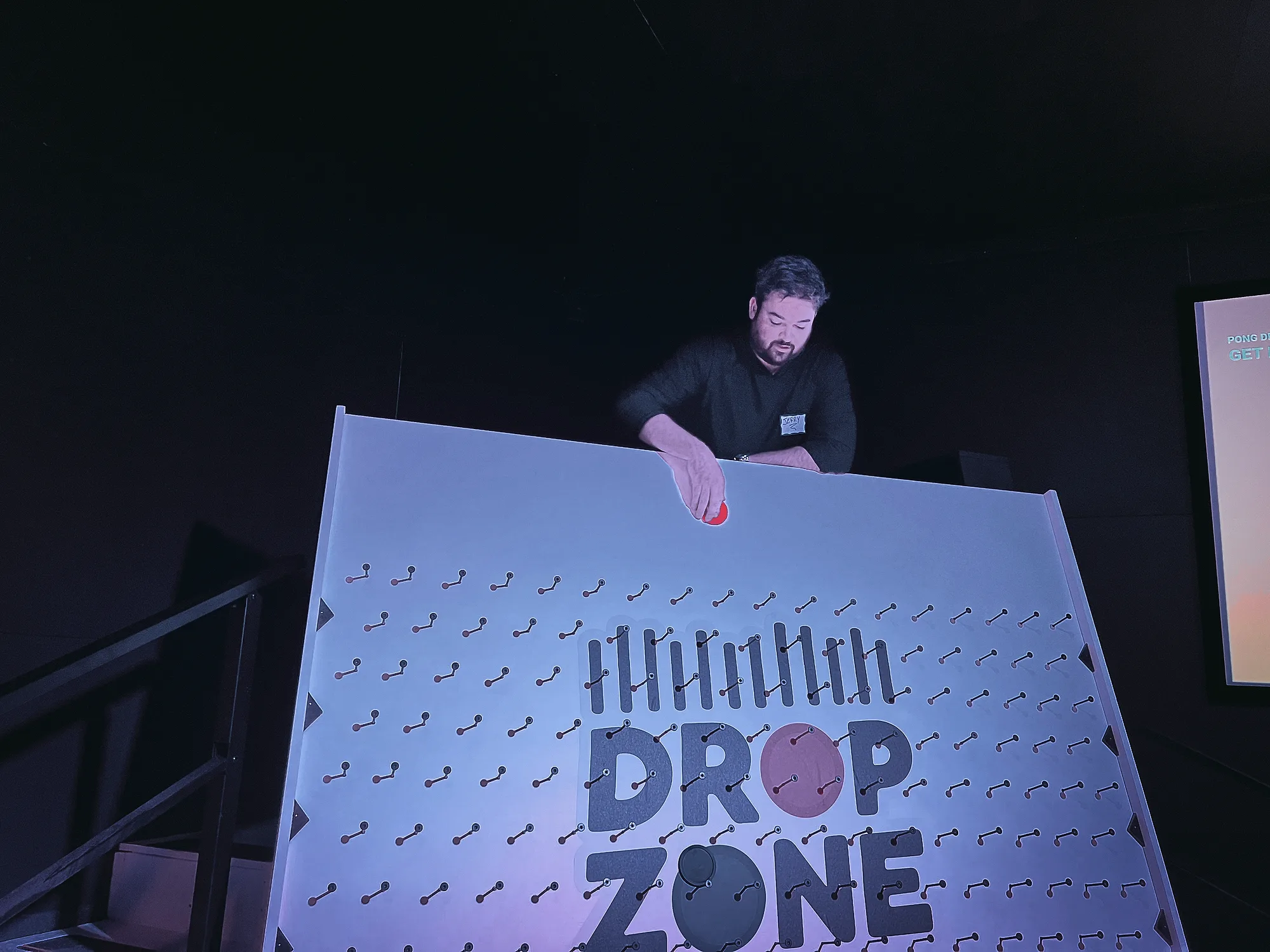 Guest taking on the Drop Zone game show challenge